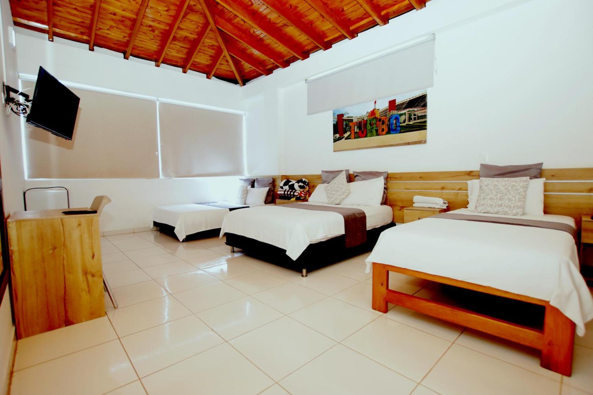 Hotel Blue Paradise Inn Turbo Extérieur photo